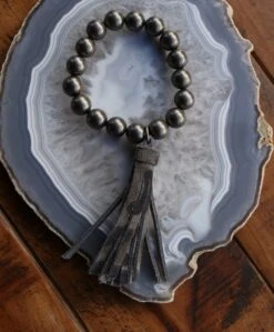 Turquoise Haven Women's Black Cheetah Tassel Bracelet